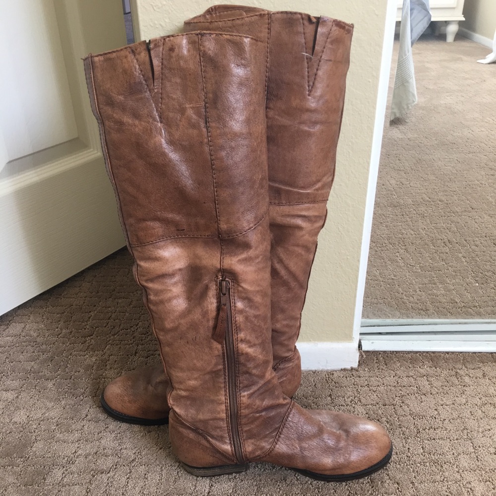 Knee high brown leather boots